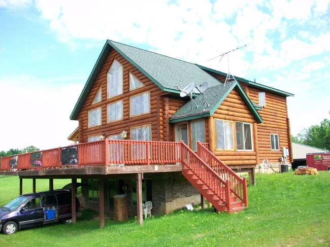 Top Coat Log Home Restoration