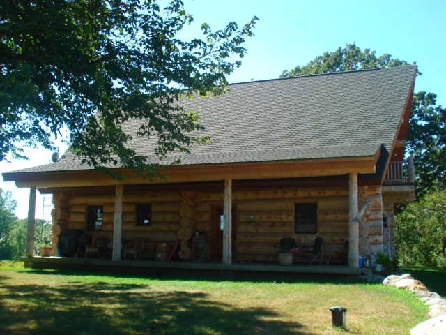 Top Coat Log Home Restoration