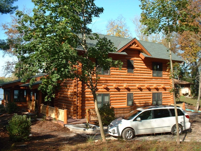 Top Coat Log Home Restoration