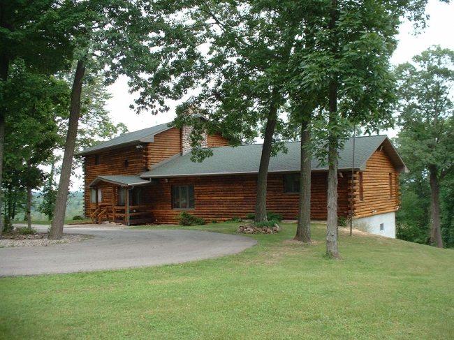 Top Coat Log Home Restoration