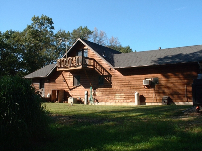 Top Coat Log Home Restoration