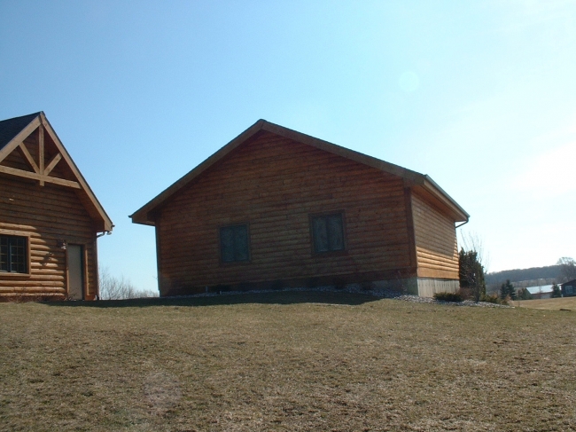 Top Coat Log Home Restoration