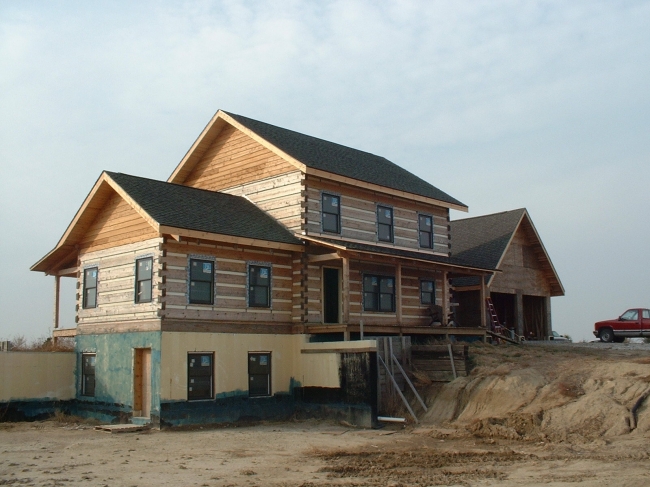 Top Coat Log Home Restoration