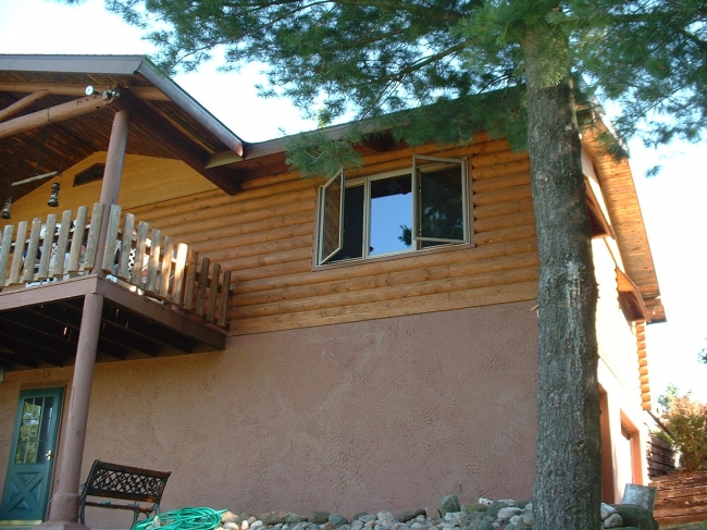 Top Coat Log Home Restoration