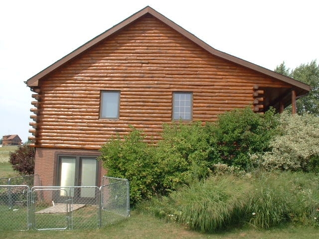 Top Coat Log Home Restoration