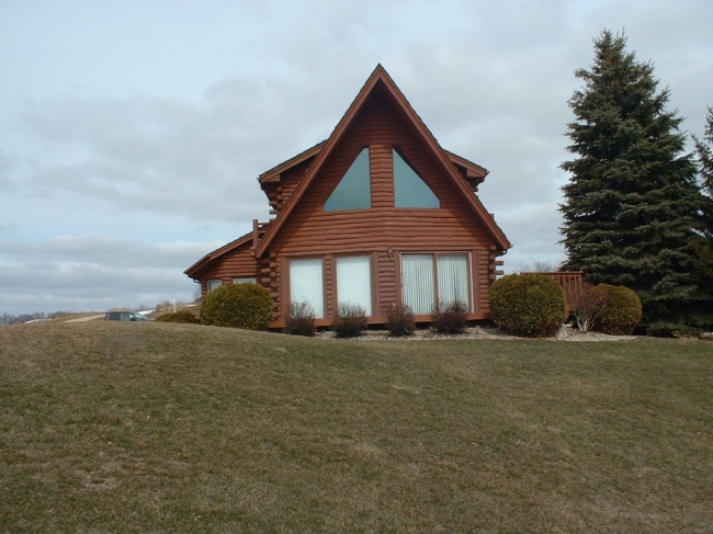 Top Coat Log Home Restoration