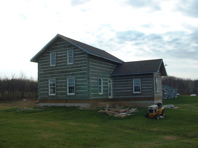 Top Coat Log Home Restoration