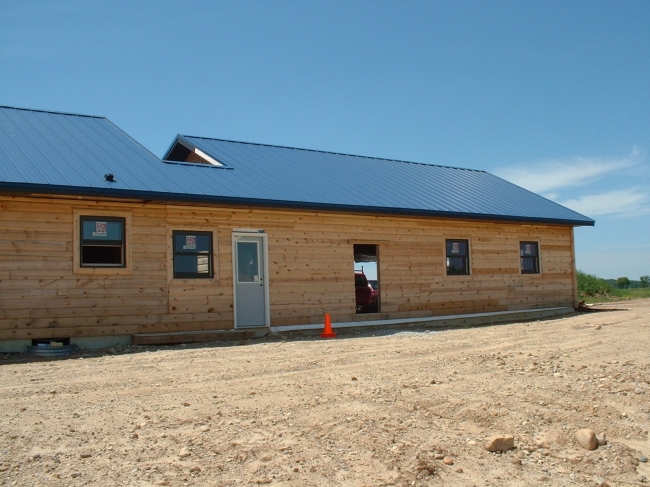 Top Coat Log Home Restoration