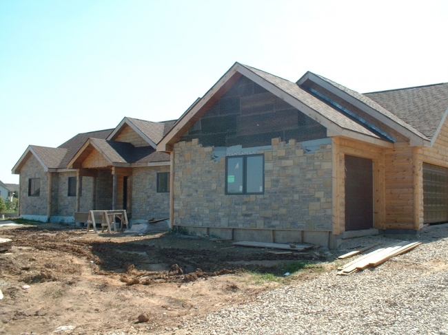 Top Coat Log Home Restoration