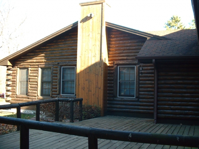 Top Coat Log Home Restoration