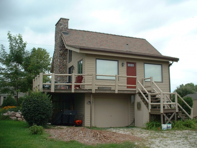 Top Coat Log Home Restoration